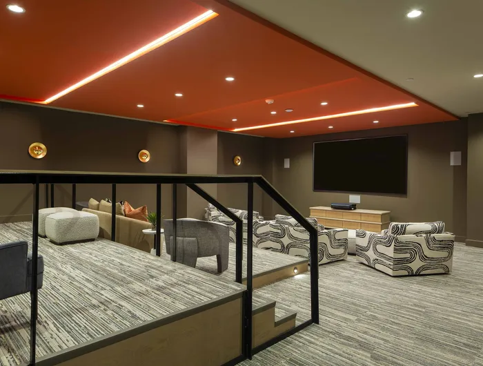 theater room with large projection screen