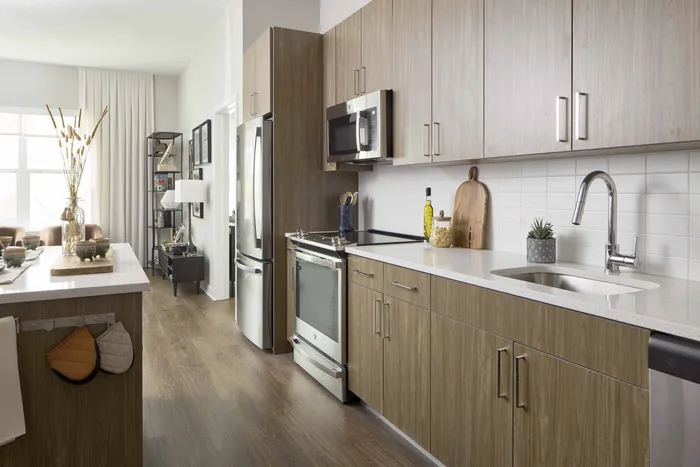large kitchen area overlooking living room