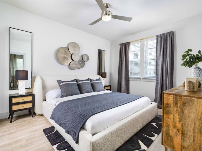 Spacious bedroom with large windows to call home at Modera Georgetown