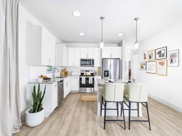 View of kitchen with spacious chef's island perfect for hosting