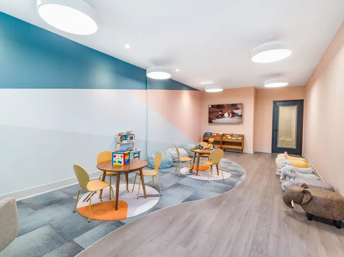 community room with coffee bar and plenty of cozy seating