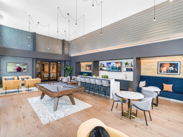 community room with coffee bar and plenty of cozy seating