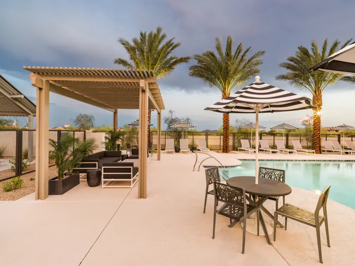 pool cabana and outdoor seating on pool deck at amavi aster ridge single family homes for rent in phoenix az