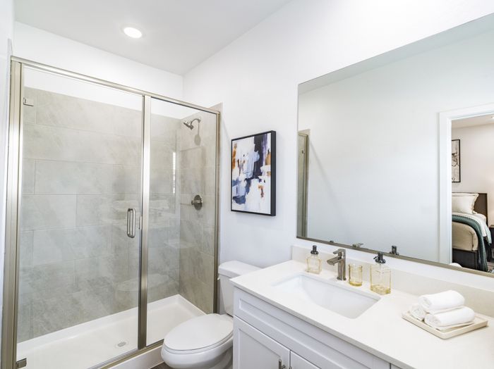 bathroom with glass enclosed shower at amavi aster ridge single family homes for rent in phoenix az