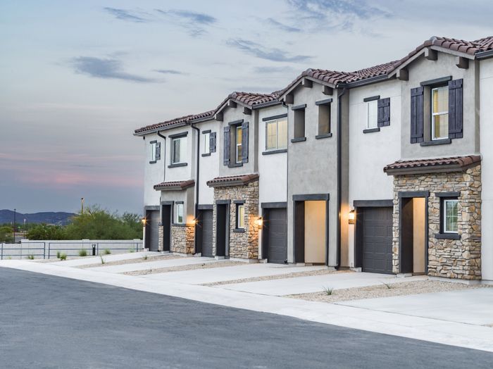 streetview exterior of single family townhomes with driveways at amavi aster ridge single family homes for rent in phoenix az