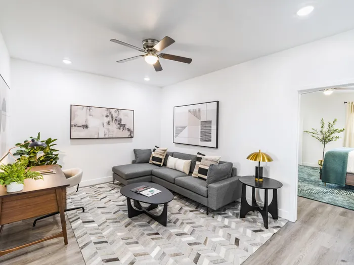 sectional in living area looking on to adjoining room at amavi aster ridge single family homes for rent in phoenix az