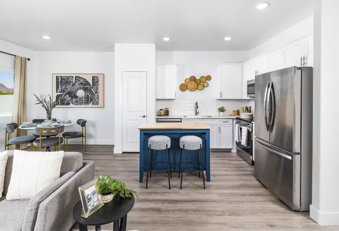 view of kitchen and living area with open floor plan home at amavi aster ridge single family homes for rent in phoenix az