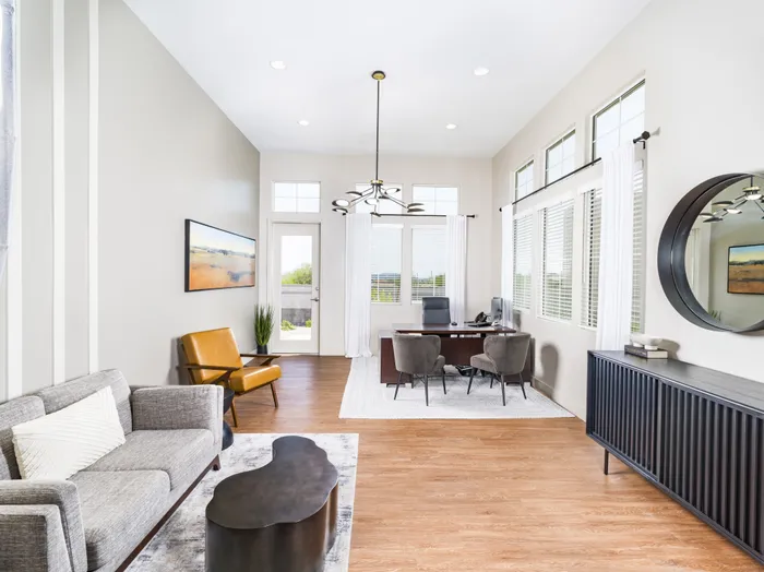 living room with open floor plan and large windows at amavi aster ridge single family homes for rent in phoenix az