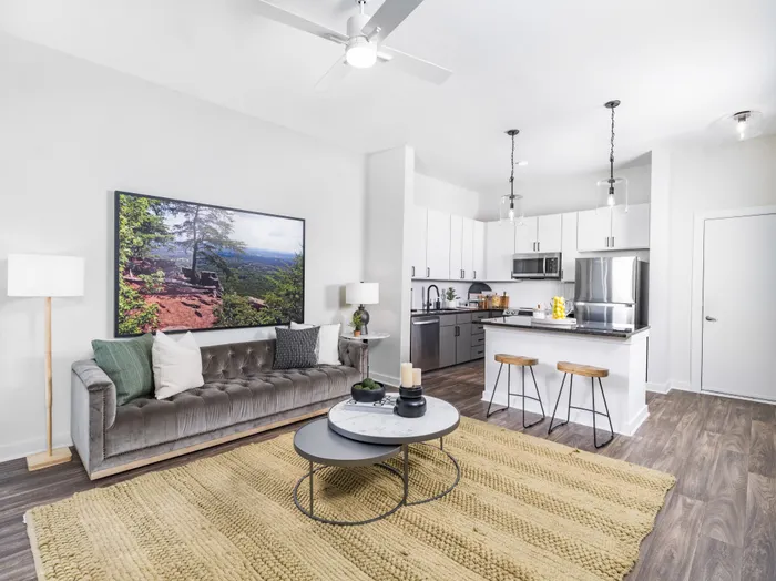 living room looking onto kitchen open floor plan area alister uptown apartment homes for rent in charlotte nc