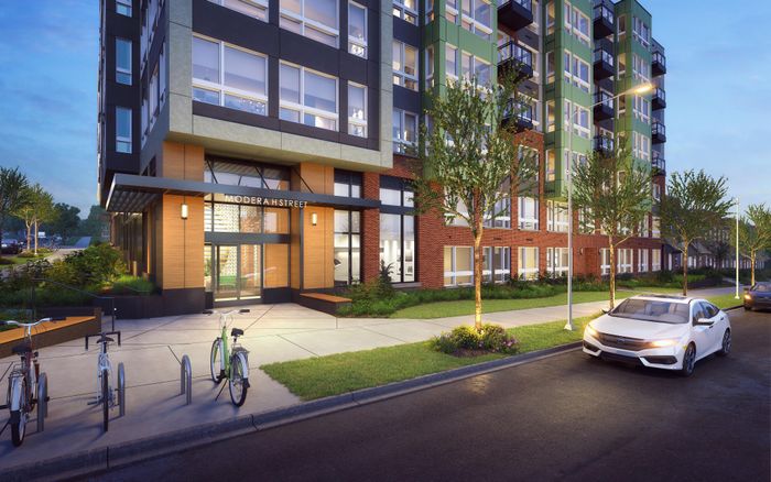 corner of apartment building with bikes parked near sidewalk modera h street apartment homes for rent in washington dc