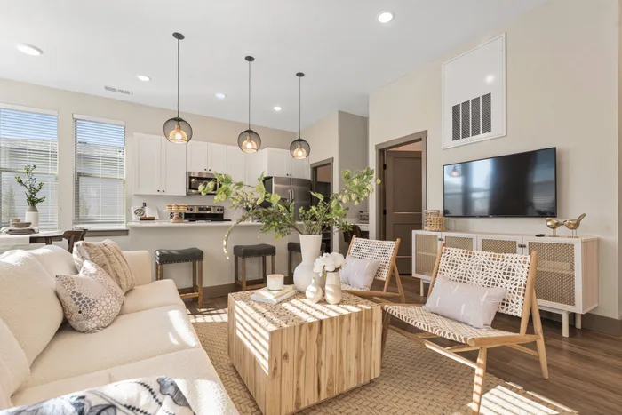 Open concept living inside homes at Modern Craftsman Black Cat