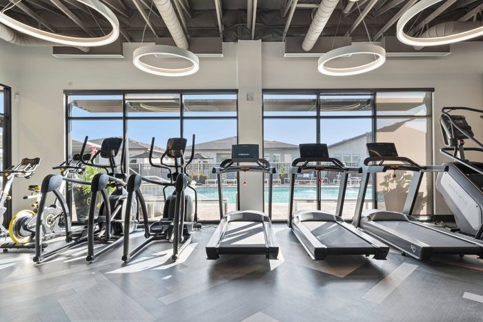 Fitness Center with Cardio equipment at Modern Craftsman Black Cat homes in Meridian, ID