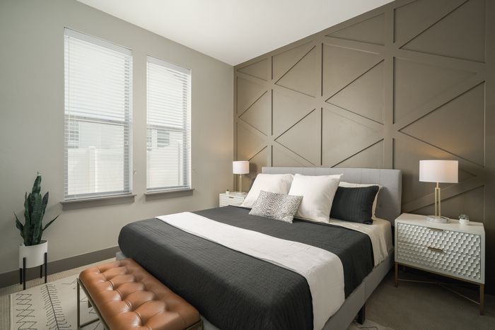 bedroom with large windows at Modern Craftsman Ten Mile homes in Meridian, ID
