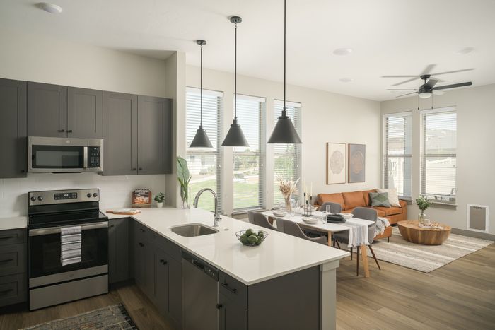 kitchen with pendant lighting at Modern Craftsman Ten Mile homes in Meridian, ID