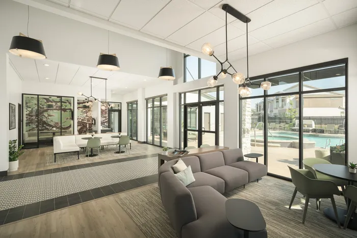 Clubhouse with couches near pool at Modern Craftsman Ten Mile homes in Meridian, ID