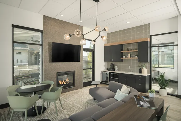 Clubhouse with TV and fireplace at Modern Craftsman Ten Mile homes in Meridian, ID
