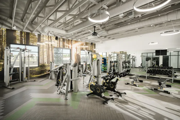 Gym with weight training equipment at Modern Craftsman Ten Mile homes in Meridian, ID