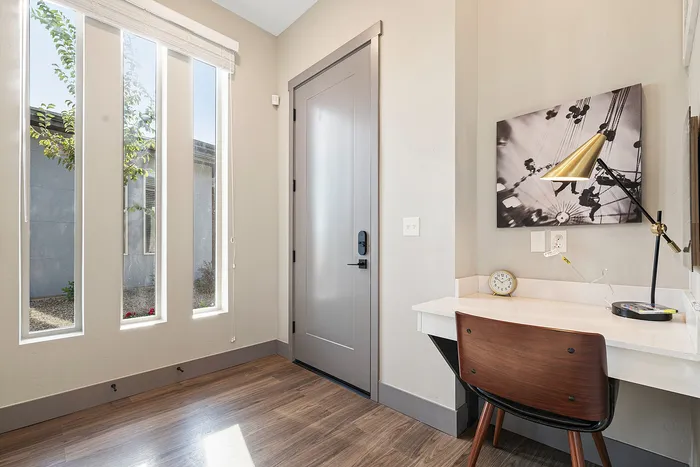 Ample natural lighting and a built in desk inside homes at Modern Craftsman Black Cat