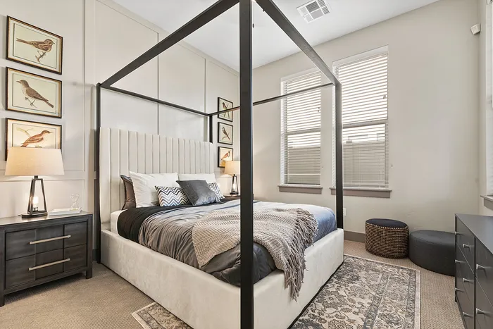Furnished bedroom with carpet inside homes at Modern Craftsman Black Cat