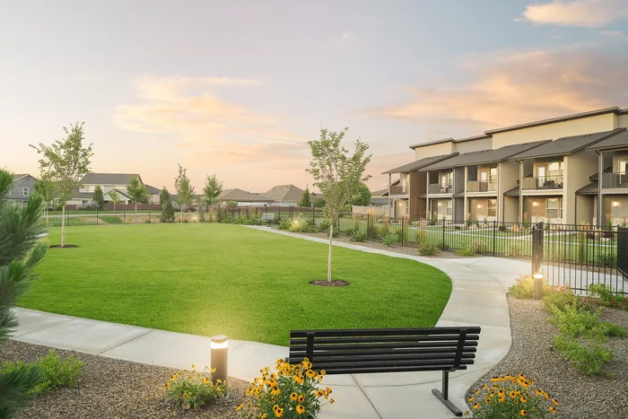 Community Space with bench at Modern Craftsman Black Cat homes in Meridian, ID