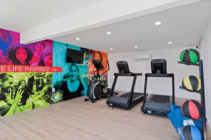 Apartments for Rent in Laurel - South Ridge Apartments Carpeted Gym With Updated Machines And Equipment And TV