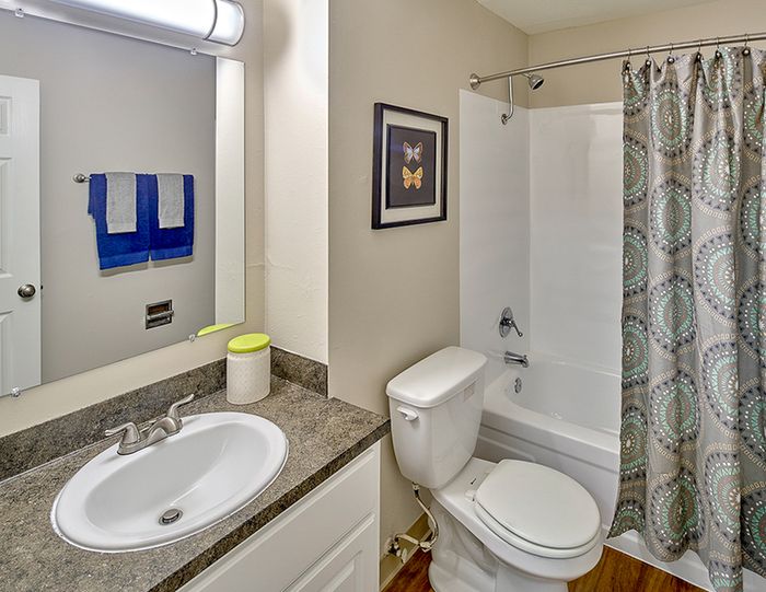 Apartments in Renton WA-Sunset View Bathroom with Large Tub and Shower Area and Plenty of Cabinet and Counter Space