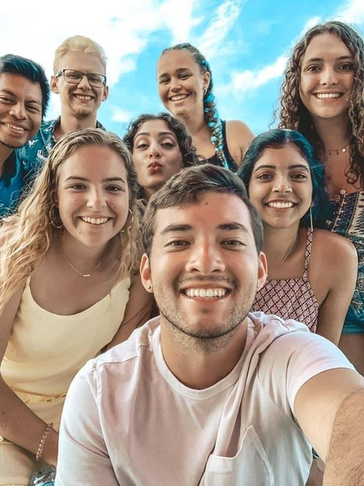 Friends smiling for a selfie