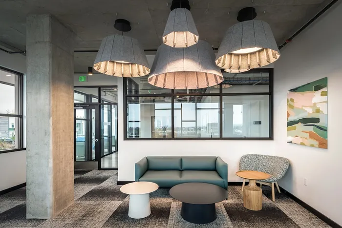 Lounge with comfortable seating and tables