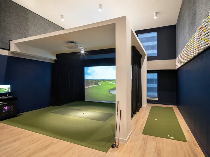 Virtual golf simulator for residents to work on their golf swing at Union on 24th apartments in Austin, TX.