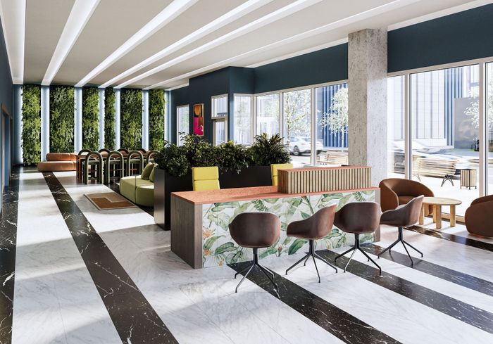 Rendering of the upcoming renovation to the lobby entrance with new seating and desks