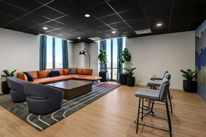 Music lounge with comfortable seating and space for residents to play instruments