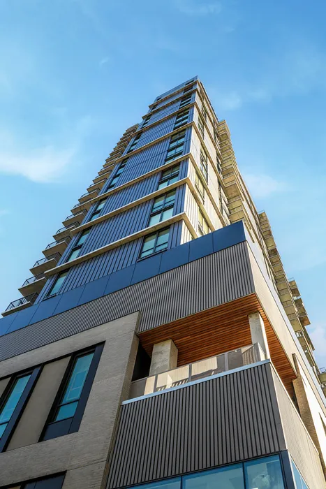Exterior of the building with the blue sky behind it