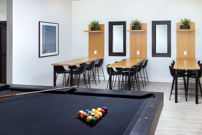 Resident game lounge with  pool table at Union Knoxville apartments near downtown Knoxville, TN