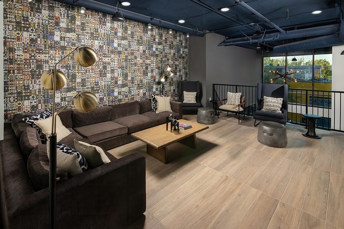 Resident lounge with couch and gathering spaces at Union Knoxville apartments near downtown Knoxville, TN.