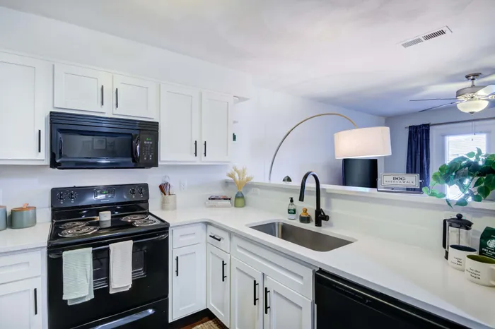 Unit kitchen white counters and beautiful white cabinets