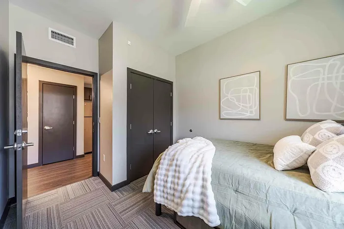 Second view of Bedroom with green comforter