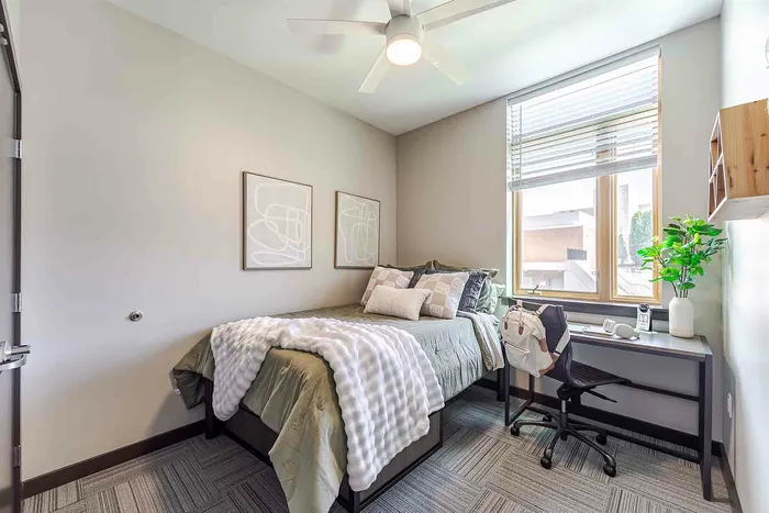 Bedroom with green comforter