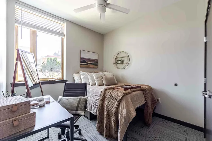 Bedroom with beige bedding