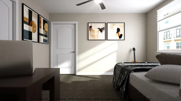 Inviting bedroom with modern artwork, cozy carpet flooring, bright natural light, and a sleek ceiling fan, creating a perfect blend of comfort and style.