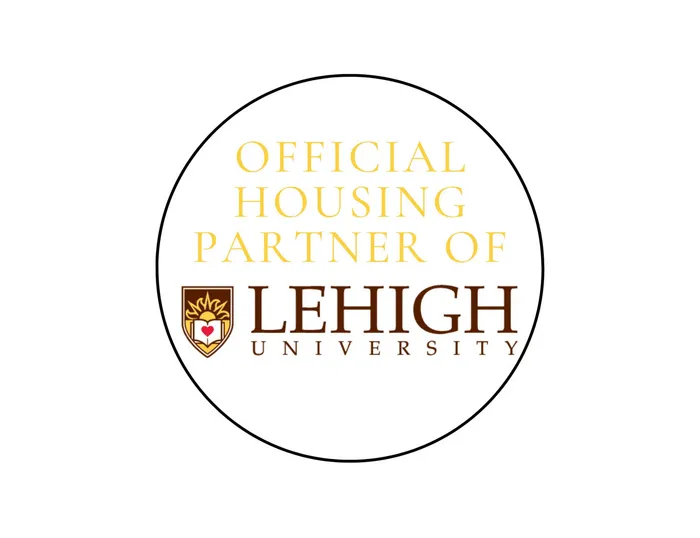 Official housing partner emblem of Lehigh University featuring elegant gold and brown typography.