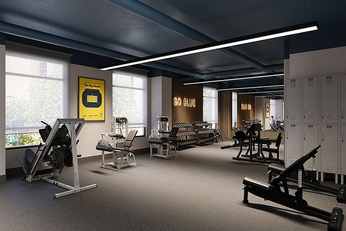 Modern gym facility with state-of-the-art equipment, sleek design, and vibrant motivational decor.