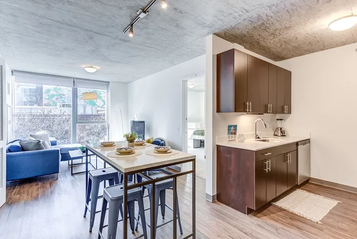 Open Kitchen with Dining Table in Living Room
