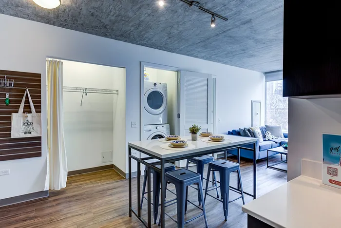 Living Room with Washing Machine and Walking Closet