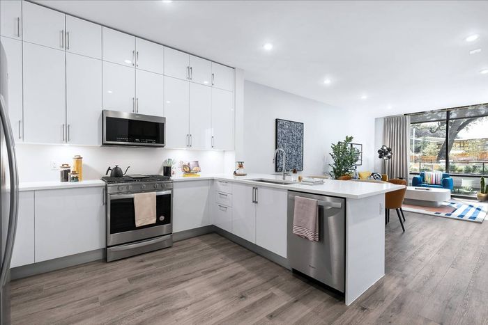 Kitchen with dining and living space