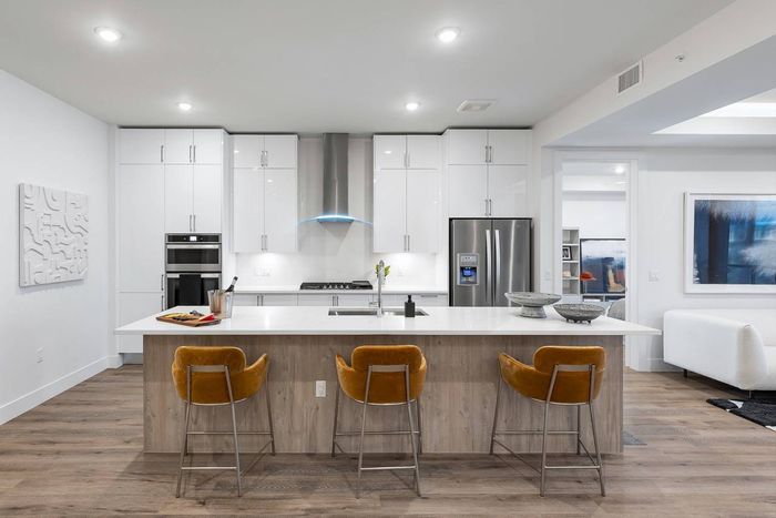 Open-concept Kitchen with bar island seating