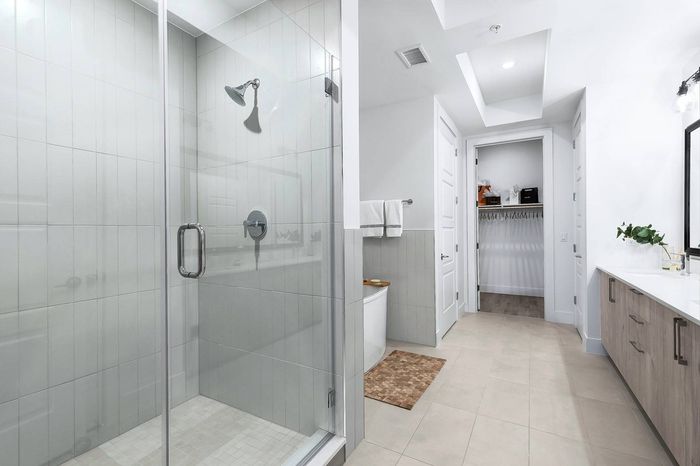 Bathroom with walk-in shower and stand-alone tub
