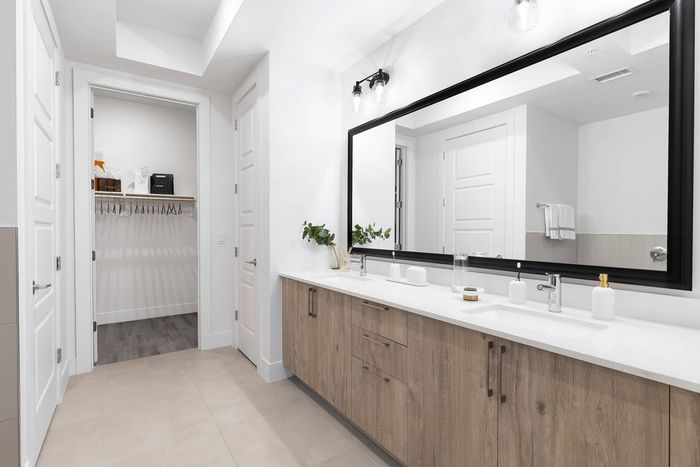 Bathroom with walk-in closet and separate toilet room