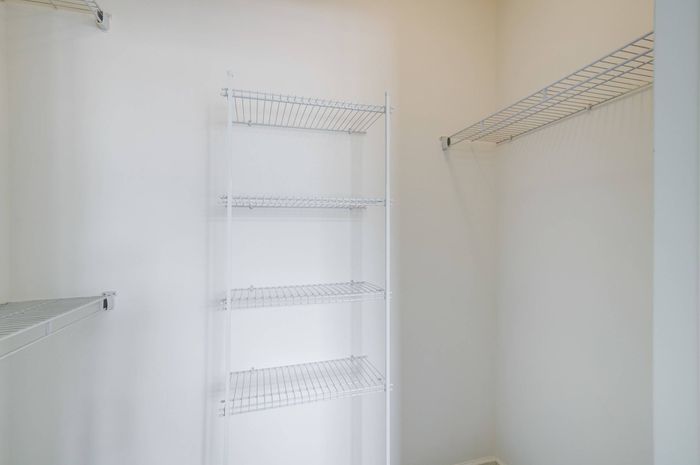 Walk-in closet in an Ossining apartment for rent.
