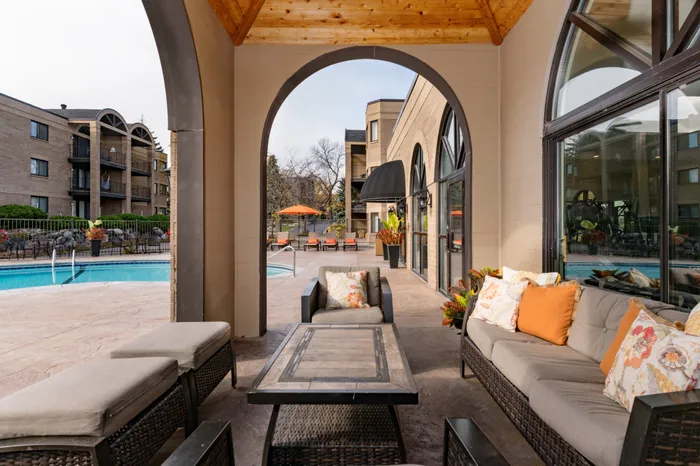 Relaxing covered seating by pool