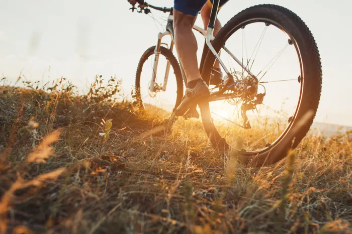 Bike riding into the sunset